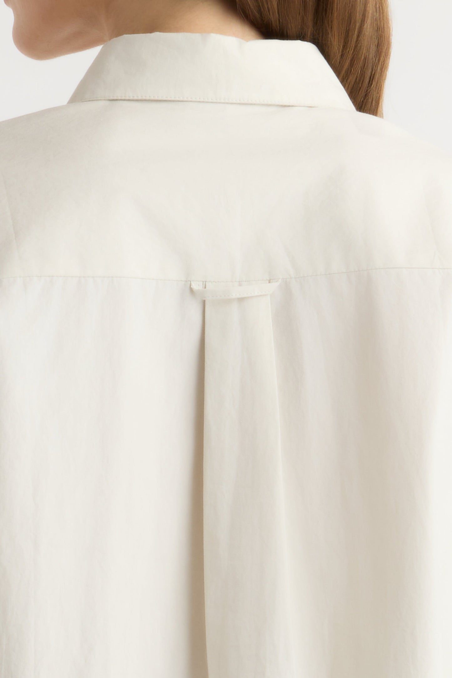 Phoebe Side-Button Tulip-Hem Shirt